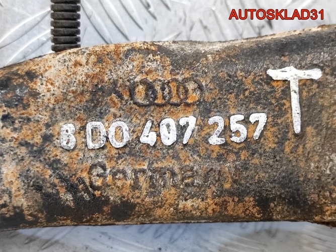 Кулак передний левый VW Passat B5 8D0407257T