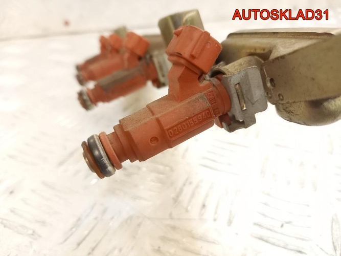 Форсунка инжекторная Nissan Almera N16 166009F600