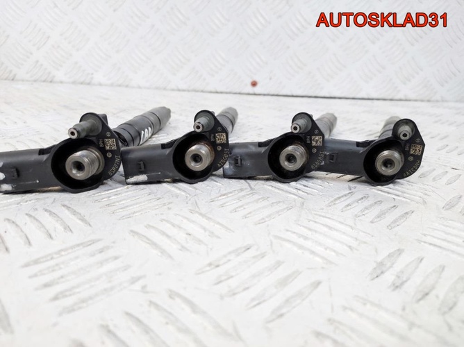 Форсунка дизельная VW Passat B6 2.0 CBA 03L130277