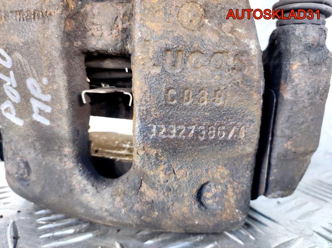 Суппорт тормозной передний правый VW Polo HB