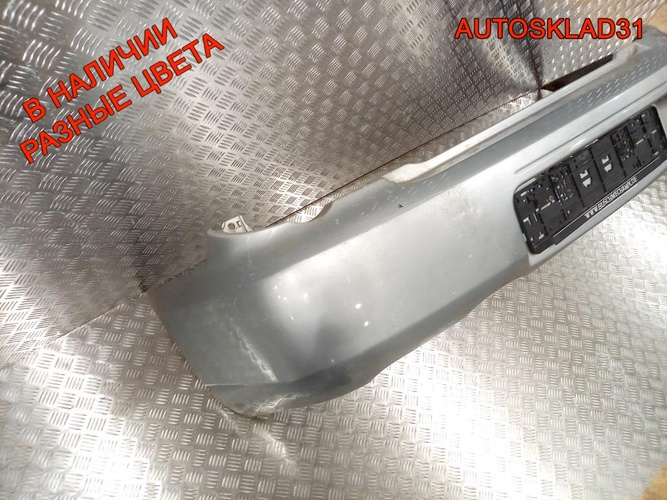 Бампер задний Subaru Impreza G11 57704FE160 Combi