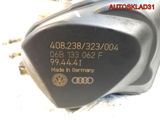 Заслонка дроссельная VW Passat B5 AZM 06B133062F