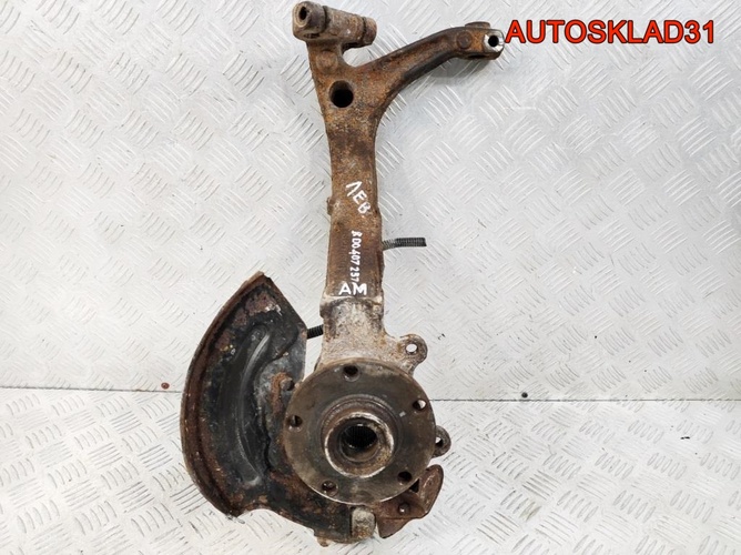 Кулак передний левый VW Passat B5 8D0407257AM