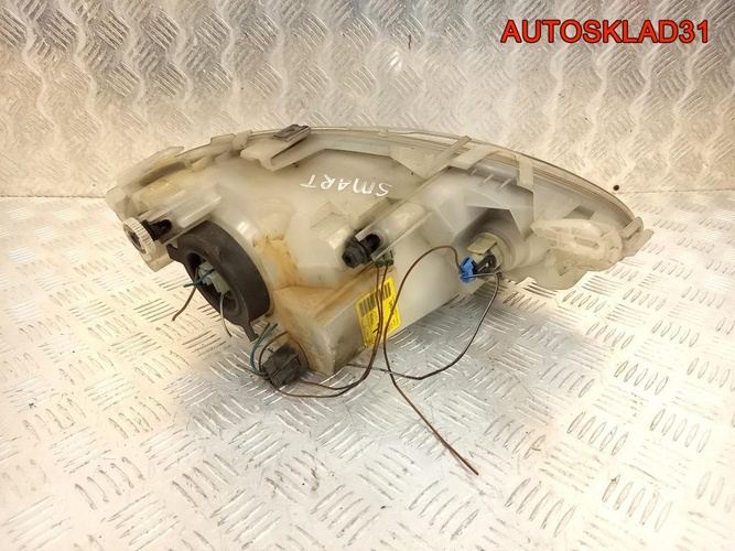 Фара левая Smart Fortwo W450 0301088313