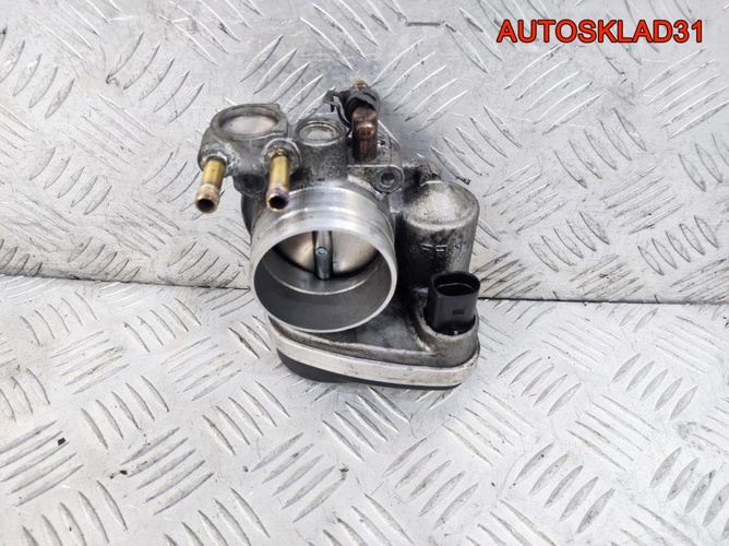 Заслонка дроссельная VW Touran 2,0 BSX 06A133062AD