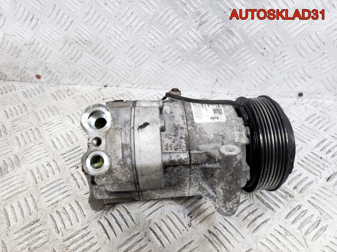 Компрессор кондиционера Opel Astra J 06572708