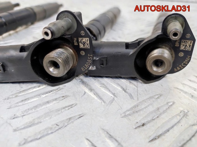Форсунка дизельная VW Passat B6 2.0 CBA 03L130277