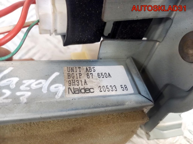 Блоку управления ABS Mazda 323 BA  BG1P67650A
