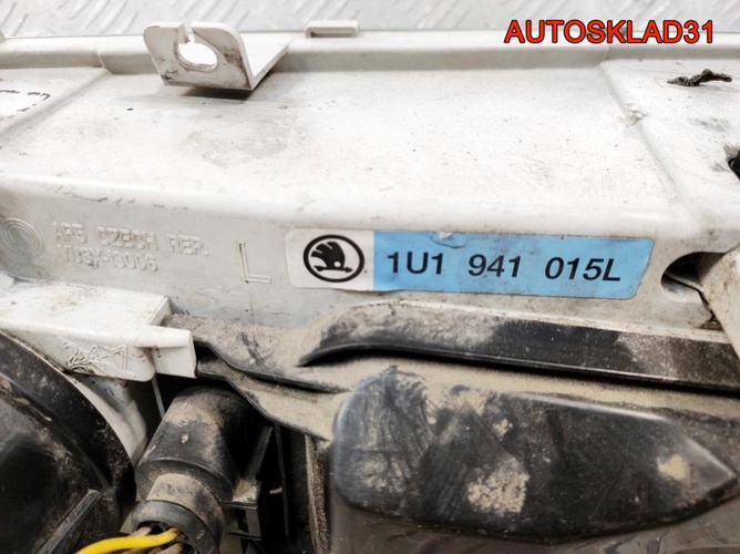 Фара левая Skoda Octavia A4 1U1941015L