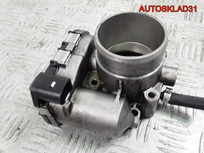 Заслонка дроссельная Audi A3 1,8 AUM 06A133062C