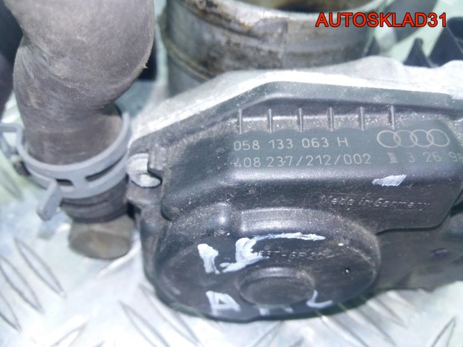 Заслонка дроссельная VW Passat B5 AHL 058133063H