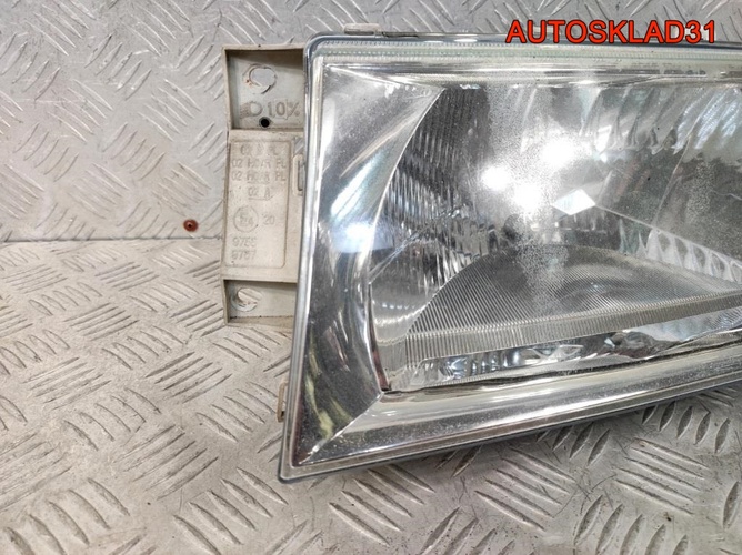 Фара левая Skoda Octavia A4 1U1941015L