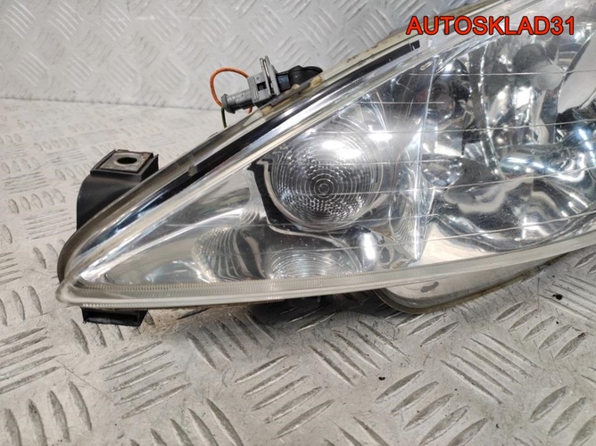 Фара левая Peugeot 206 9628666880