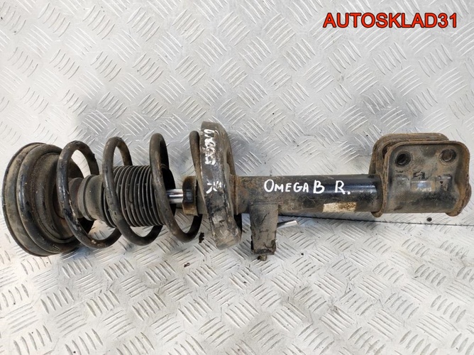 Амортизатор передний правый Opel Omega B 90575393