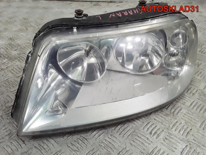 Фара левая Volkswagen Sharan 7M3941015AB