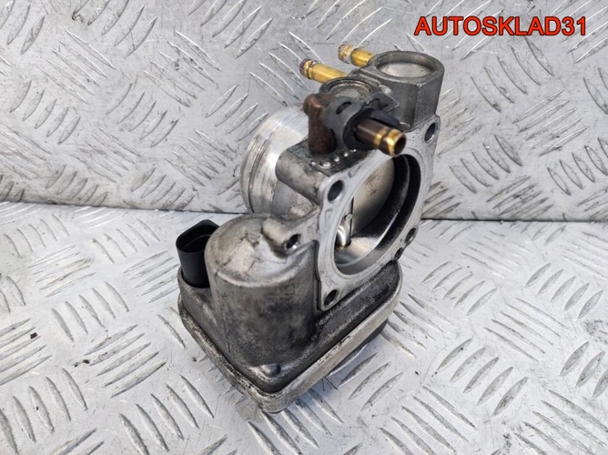 Заслонка дроссельная VW Touran 2,0 BSX 06A133062AD