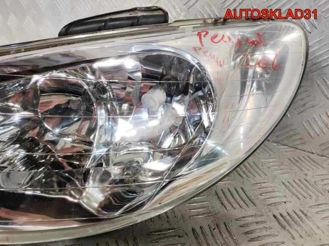 Фара левая Peugeot 206 9628666880