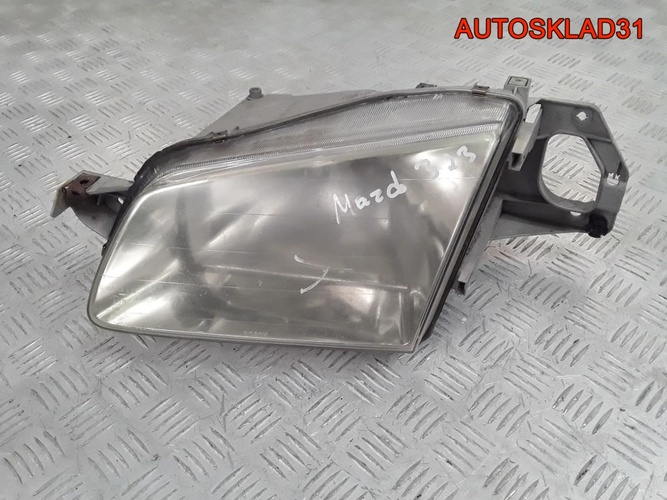 Фара левая Mazda 323 BJ 1305235392