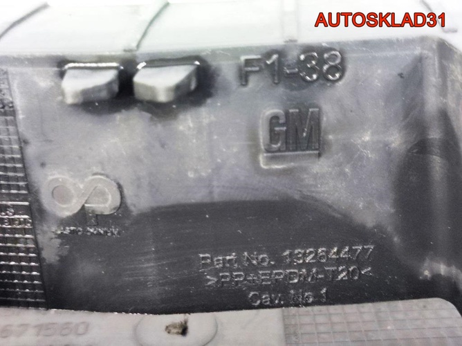 Панель передняя центральная Opel Astra J 13264477