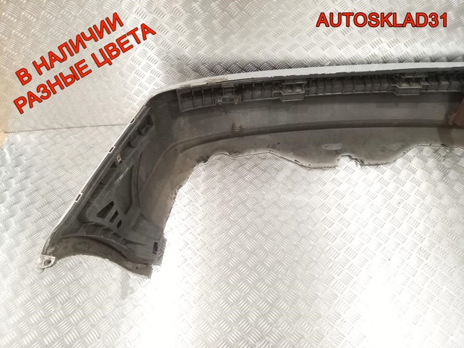 Бампер задний Mitsubishi Carisma Рестайлинг