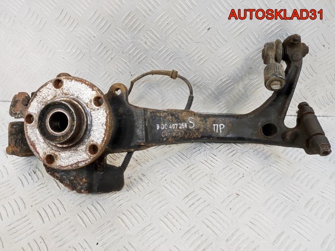 Кулак передний правый VW Passat B5 8D0407258S