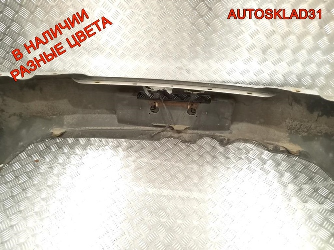 Бампер задний Subaru Impreza G11 57704FE160 Combi