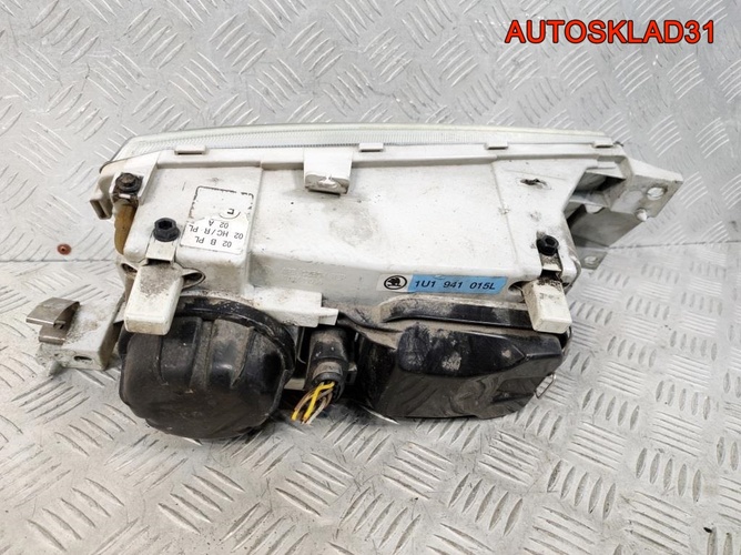 Фара левая Skoda Octavia A4 1U1941015L