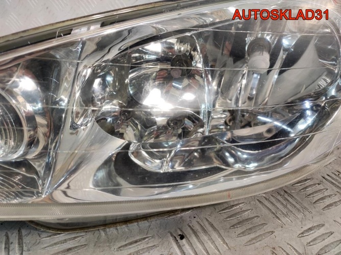 Фара левая Peugeot 206 9628666880
