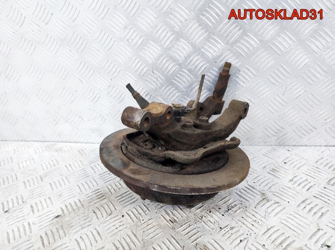 Кулак поворотный задний левый Daewoo Nubira