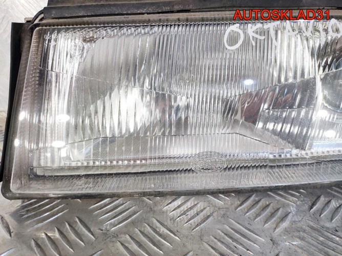 Фара левая Skoda Octavia A4 24608500