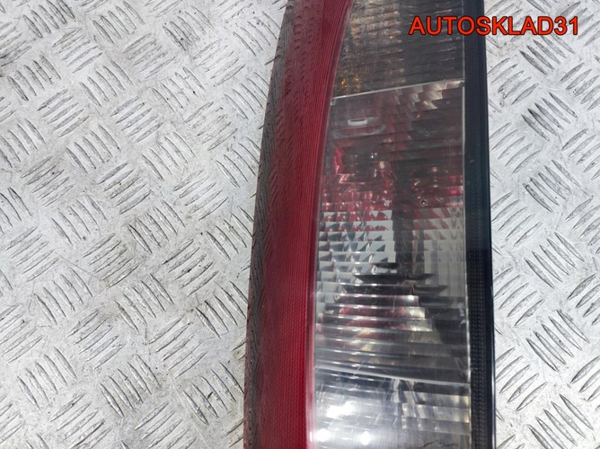 Фонарь задний левый Opel Corsa C 09114336 