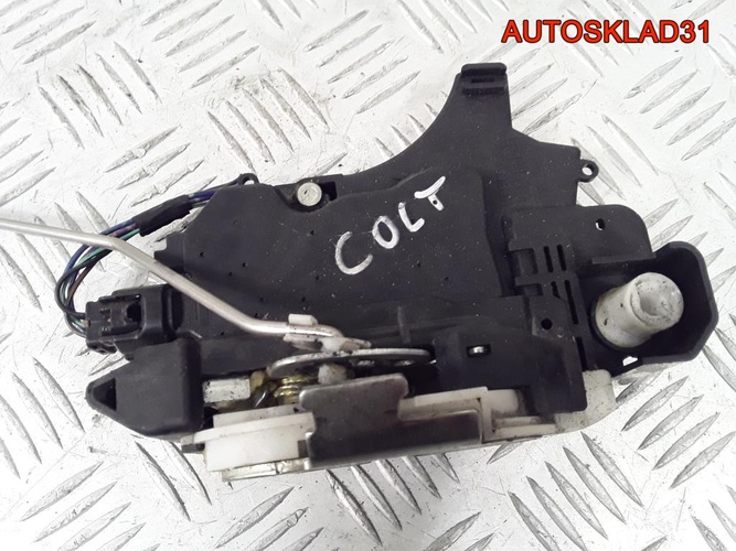 Замок двери передней левой Mitsubishi Colt MN145935