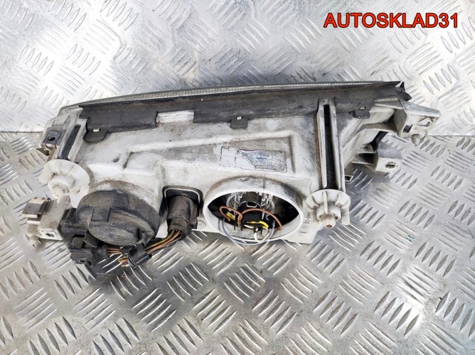 Фара левая Skoda Octavia A4 24608500