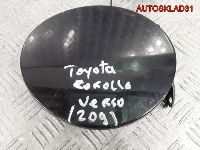 Лючок бензобака Toyota Corolla Verso 7735064010