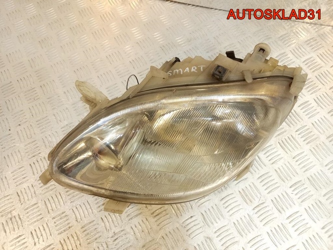 Фара левая Smart Fortwo W450 0301088313