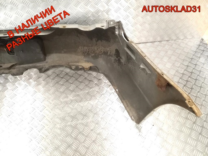 Бампер задний Subaru Impreza G11 57704FE160 Combi