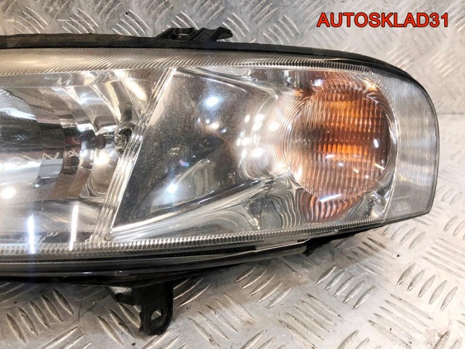 Фара левая Opel Vectra B 90586844 Рестайлинг