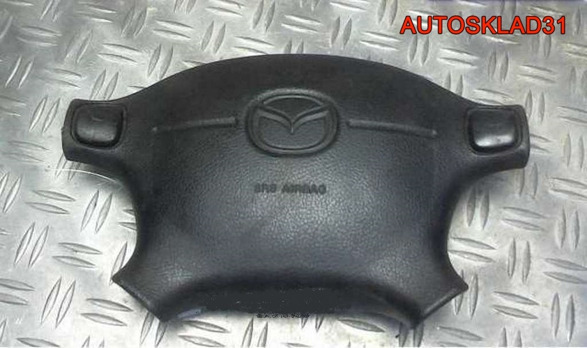 Подушка безопасности в руль Mazda 323F BC5A57K00