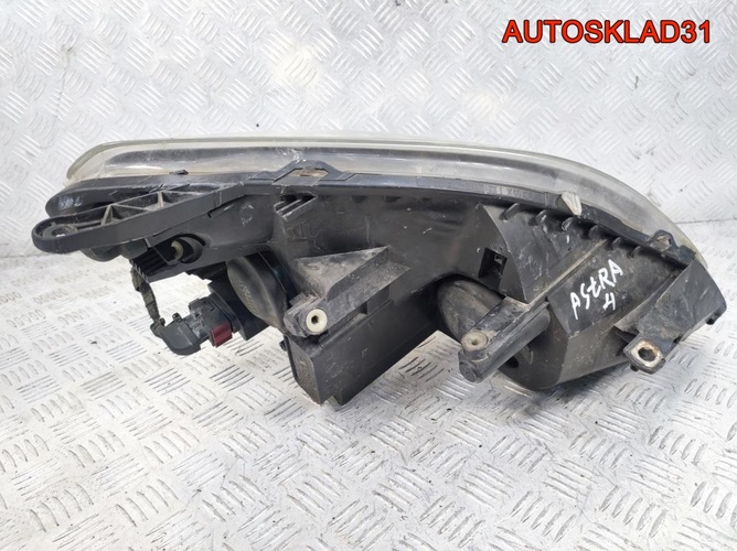 Фара левая Opel Zafira B 24451052
