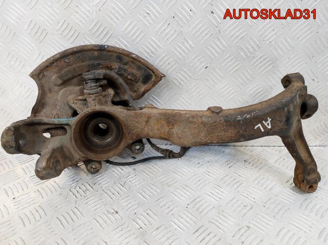 Кулак передний правый VW Passat B5 8D0407258AL