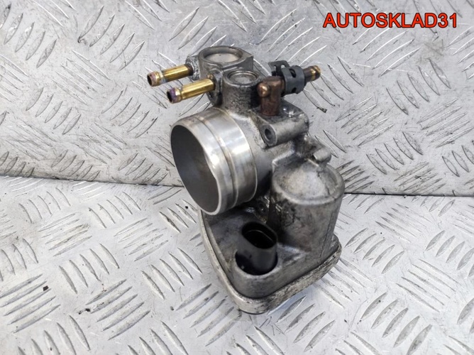 Заслонка дроссельная VW Touran 2,0 BSX 06A133062AD