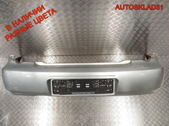 Бампер задний Subaru Impreza G11 57704FE160 Combi