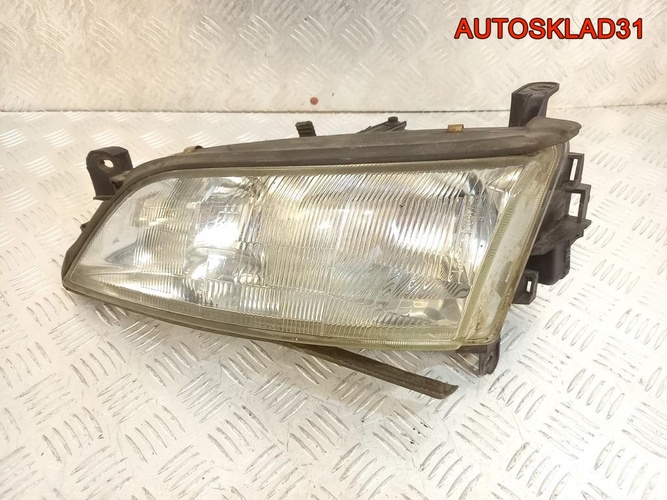 Фара левая Opel Vectra B 1216527