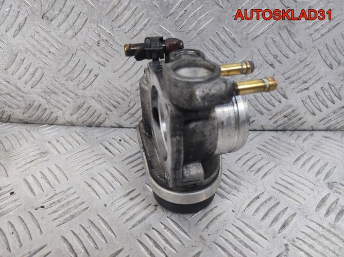 Заслонка дроссельная VW Touran 2,0 BSX 06A133062AD