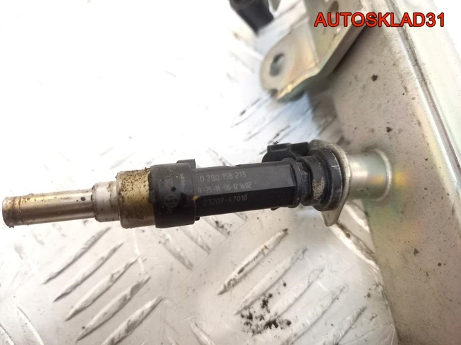 Форсунка инжекторная Toyota Yaris 1NR 2320947010