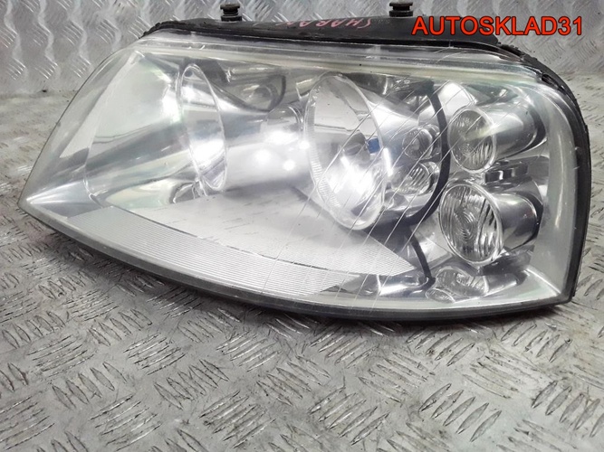 Фара левая Volkswagen Sharan 7M3941015AB