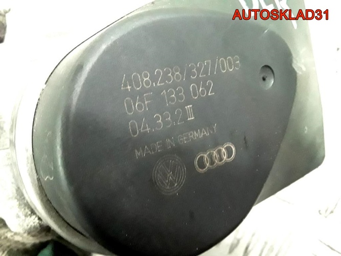 Дроссельная заслонка VW Passat B6 BLR 06F133062