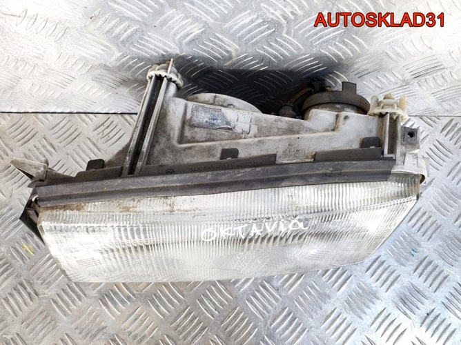 Фара левая Skoda Octavia A4 24608500