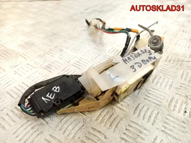 Замок двери передней левой Mazda 323 BA Хетчбэк