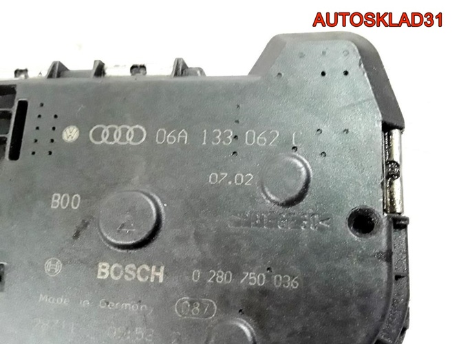 Заслонка дроссельная Audi A3 1,8 AUM 06A133062C